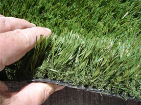 Dog turf synthetic grass closeup